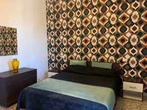 Interno 6, comodo alla fiera